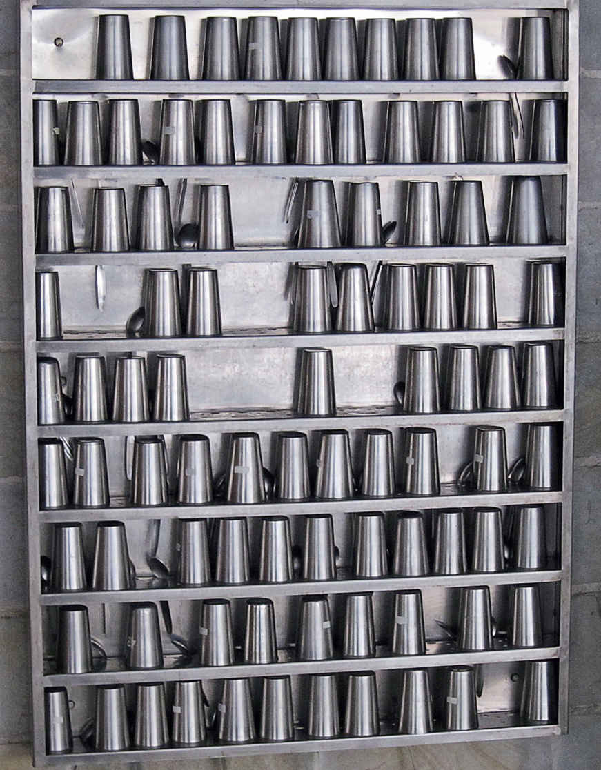 Stainless steel tumblers that diners use, wash, and return Aurobindo Ashram, Delhi