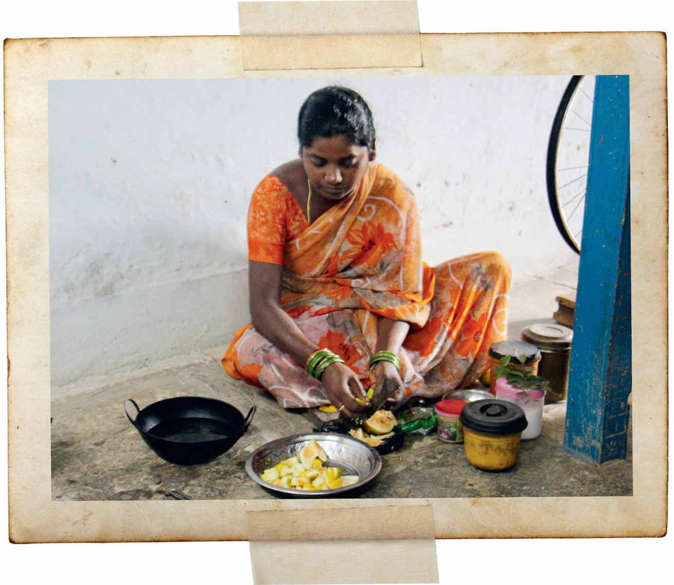 A Pochampally weaver prepares dosakai—a South Indian cucumber—for lunch, Andhra Pradesh.